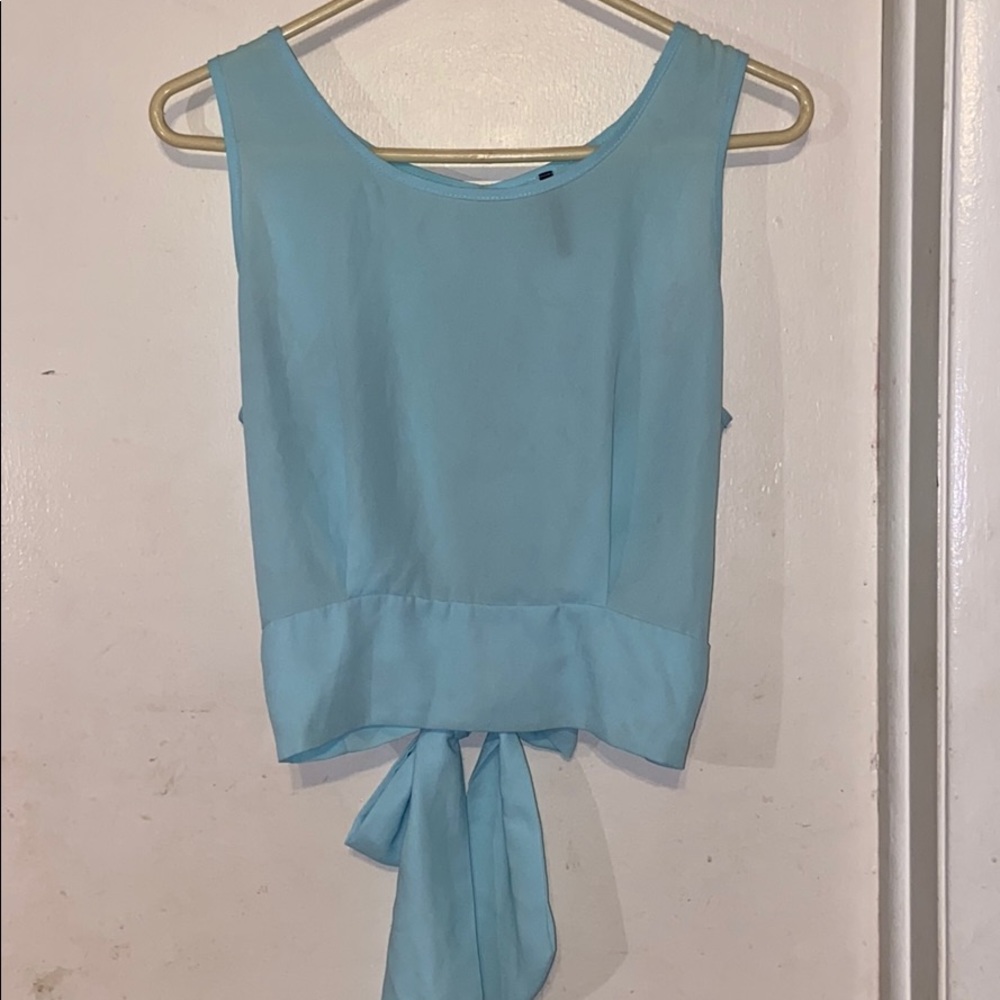 No sleeve, open back blouse